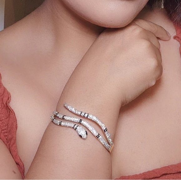 Elegant Gold and Silver Snake Bracelet - Picture 3 of 4